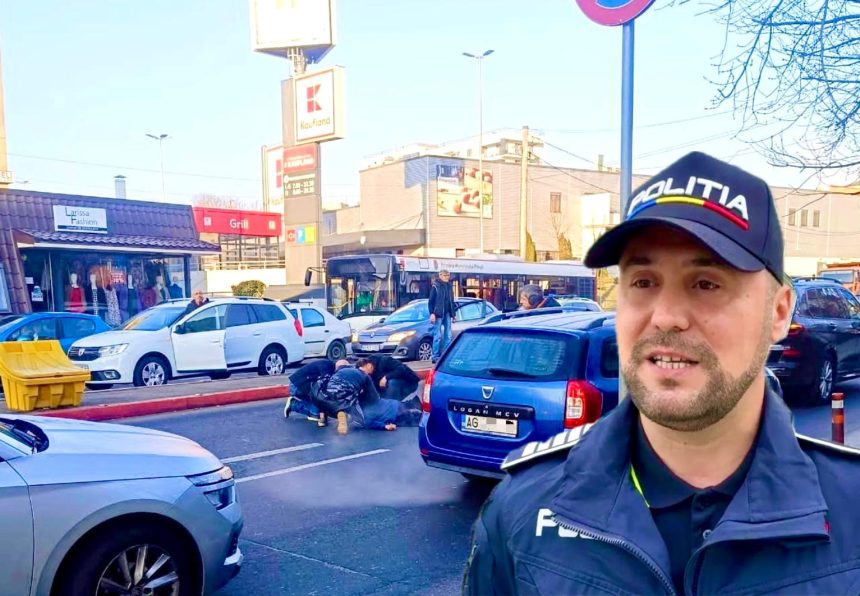 Politist oficial un sofer de BMW a trecut pe rosu si a provocat un accident