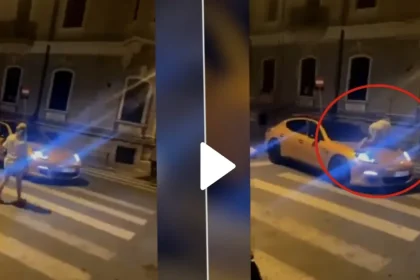 O femeie a traversat peste capota unui Porsche oprit pe trecere.